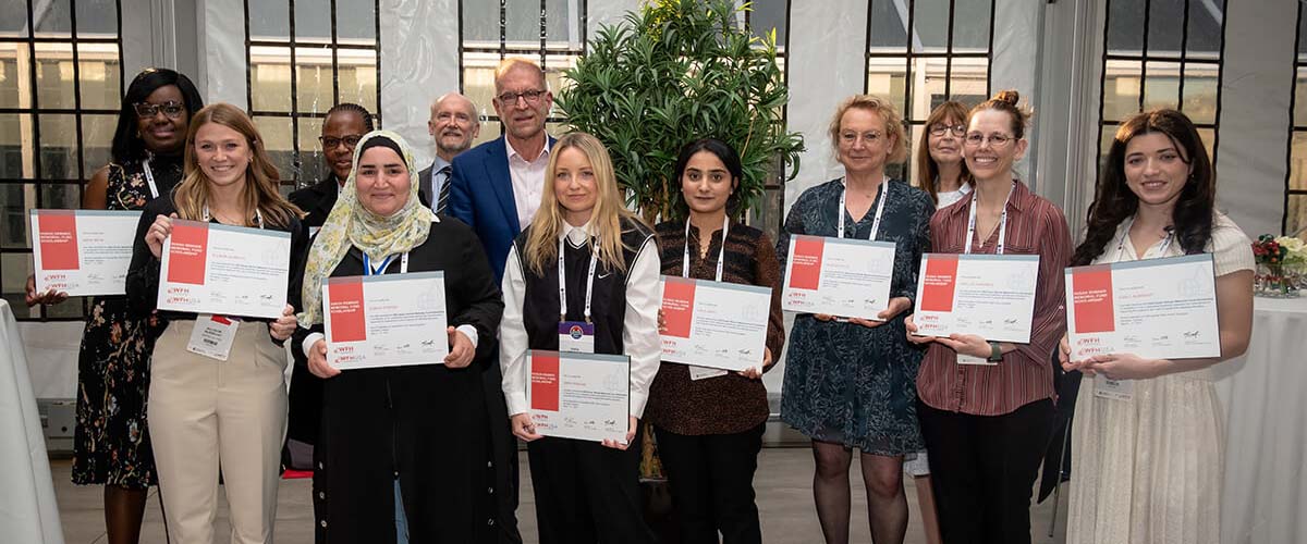 The 2022 SSMF recipients smile, holding their certificates